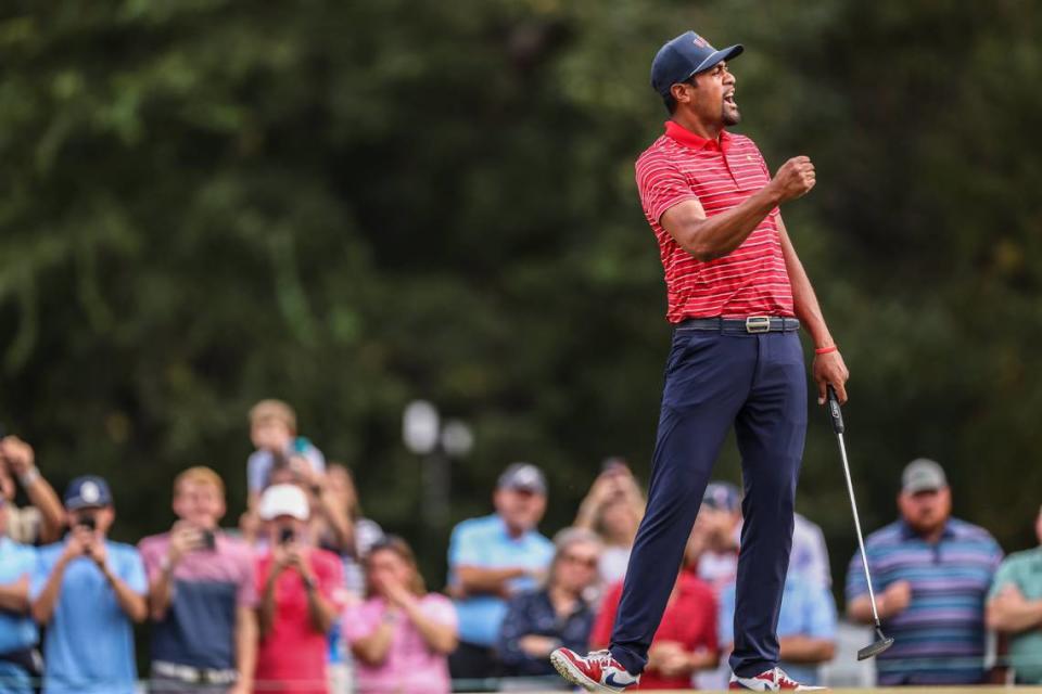 Tony Finau celebrates after making a putt on the 17th hole during the final round of the Presidents Cup at Quail Hollow Golf Club in Charlotte, N.C., on Sunday, September 25, 2022.