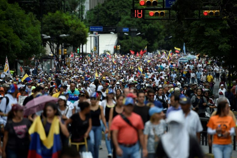 Opposition activists marched to Venezuela's Supreme Court in their latest action against embattled President Nicolas Maduro