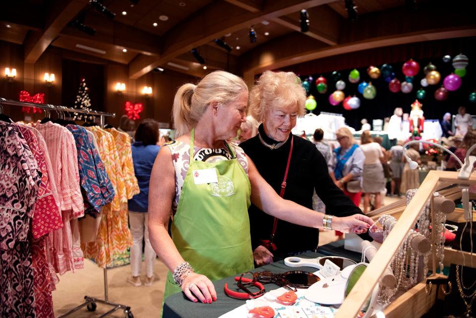 Pam Williams and her mother Maureen Pearce shop for jewelry at Zwikker and Zacher at the Garden Club of Palm Beach's 2022 Christmas Boutique and Silent Auction. This year's preview party is slated for Nov. 8.