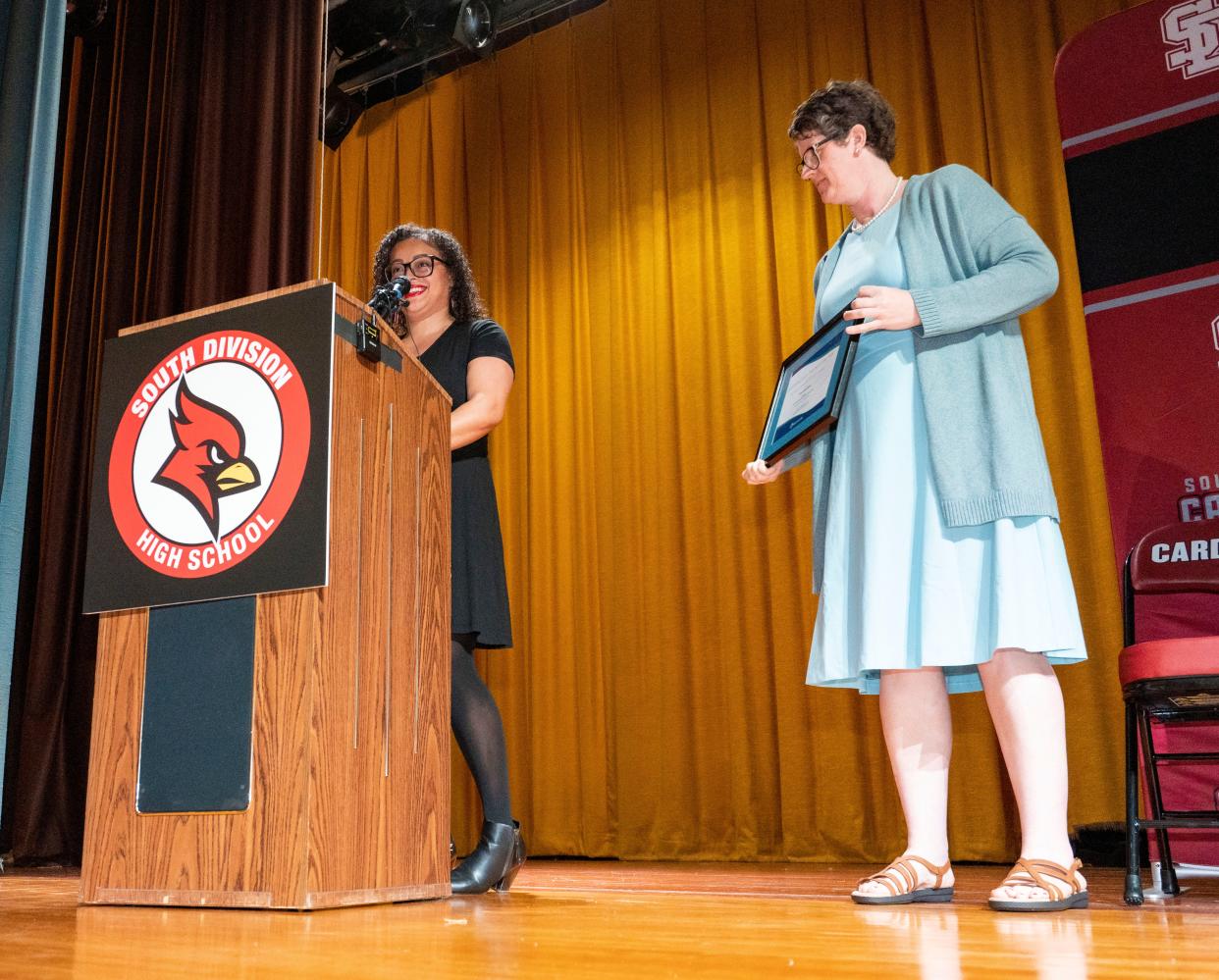 Ana Báez, left, a bilingual counselor at South Division High School, was surprised with a Wisconsin Teacher of the Year Award on May 9.  Among those at the ceremony were State Superintendent Jill Underly, right.