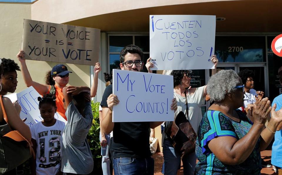 A group of activists protested in front of the Miami-Dade Elections Department on Saturday, November 10, 2018, demanding that all ballots be counted, included some found at an Opa-locka mail facility.