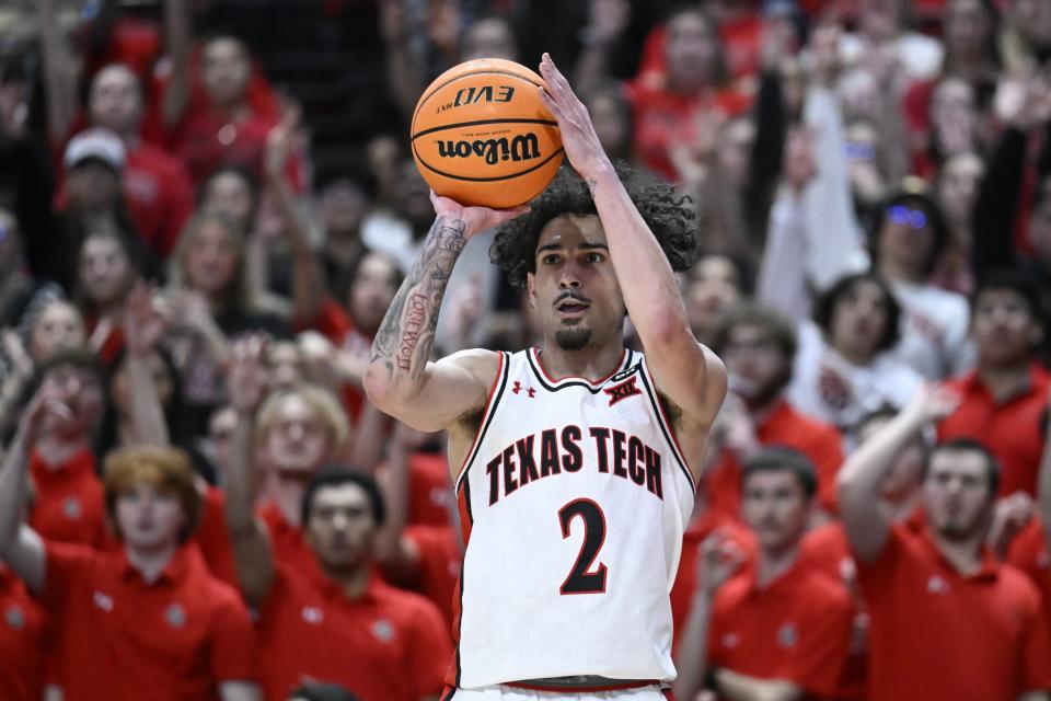 Texas Tech guard Pop Isaacs (2) shoots from 3-point range against TCU during the first half of an NCAA college basketball game Tuesday, Feb. 20, 2024, in Lubbock, Texas. (AP Photo/Justin Rex)