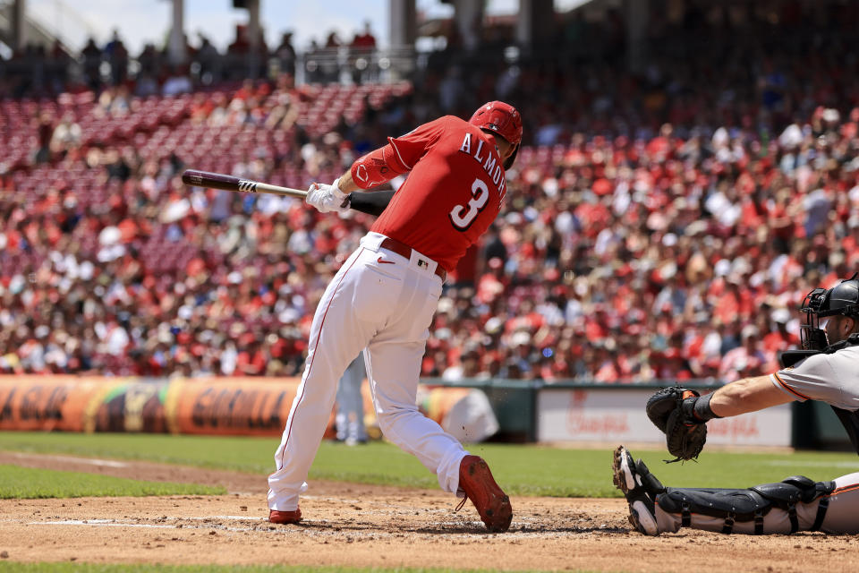 Cincinnati Reds' Albert Almora Jr. hits an RBI single during the second inning of a baseball game against the San Francisco Giants in Cincinnati, Sunday, May 29, 2022. (AP Photo/Aaron Doster)