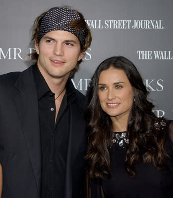 Ashton Kutcher and Demi Moore at the Hollywood premiere of MGMs' Mr. Brooks