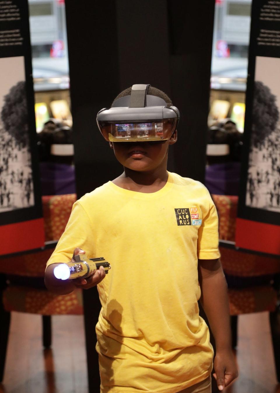 A child tries out a virtual reality headset during a recent Cucalorus Film Festival, which has been a champion of independent film in Wilmington for nearly 30 years.