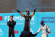 Formula E - FIA Formula E Santiago ePrix - Santiago, Chile - February 3, 2018. Techeetah's driver Jean-Eric Vergne of France (C) celebrates with Techeetah driver Andre Lotterer of Germany (L) and Renault E. Dams driver Sebastien Buemi of Switzerland after winning the race. REUTERS/Rodrigo Garrido