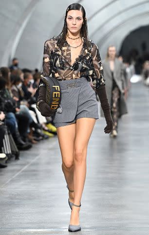 <p>Daniele Venturelli/WireImage</p> Vittoria Ceretti walks the runway at the Fendi fashion show during Milan Fashion Week on Feb. 23, 2022