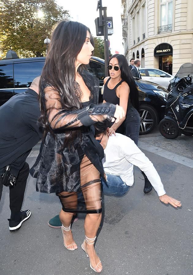 He tried to get a grip of Kim's butt. Photo: Splash.