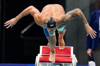 Caeleb Dressel, of United States, swims in a men's 100-meter butterfly semifinal at the 2020 Summer Olympics, Friday, July 30, 2021, in Tokyo, Japan. (AP Photo/Gregory Bull)