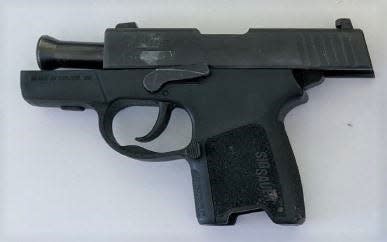 TSA officers discovered this semi-automatic pistol in a woman's carry-on bag at a security checkpoint in February 2021 at Milwaukee Mitchell International Airport.