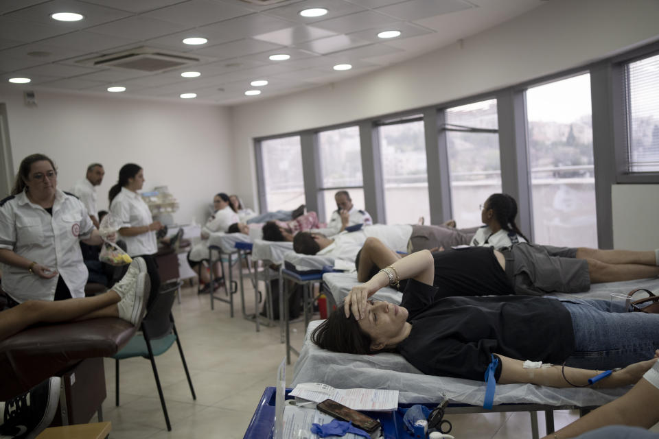 FILE - Israelis donate blood at Magen David Adom emergency service in Jerusalem, following an unprecedented attack by Hamas militants on Israel, Saturday, Oct. 7, 2023. (AP Photo/Maya Alleruzzo, File)