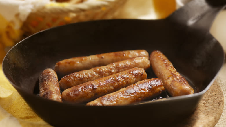 Breakfast sausages in pan