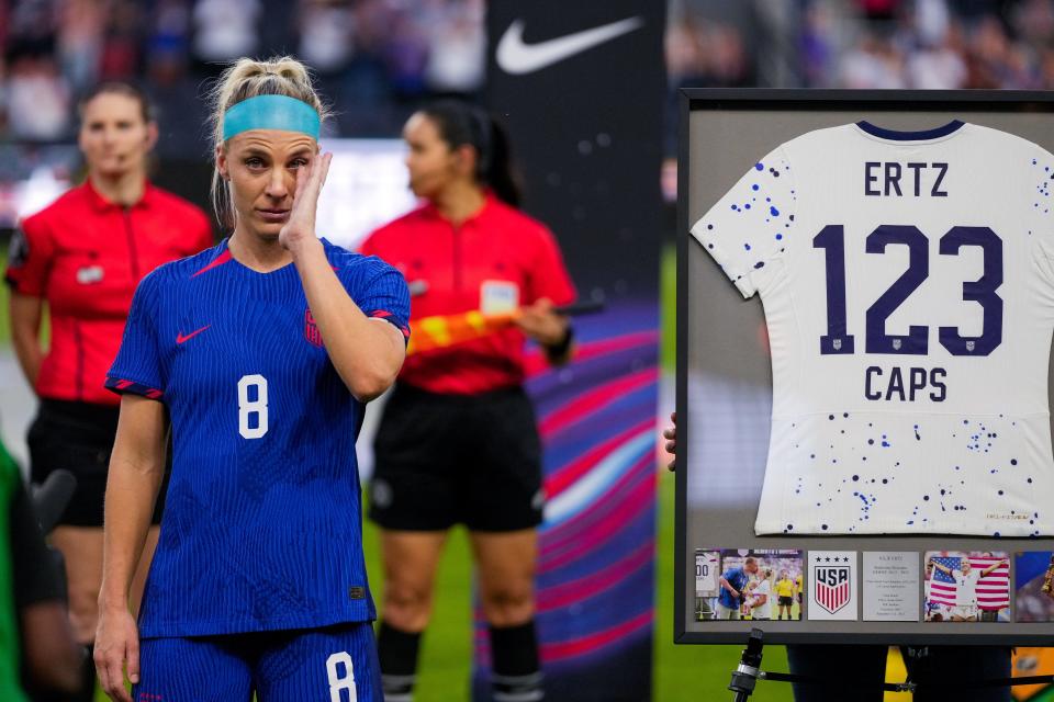 The United States Women's National Team honored Julie Ertz, who played her final game Thursday, with a framed jersey with her name to commemorate her years with the team.