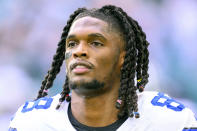 FILE - Dallas Cowboys wide receiver CeeDee Lamb (88) runs on the field before an NFL football game against the Miami Dolphins, Sunday, Dec 24, 2023, in Miami Gardens, Fla. CeeDee Lamb is a finalist for The Associated Press 2023 Offensive Player of the Year.(AP Photo/Doug Murray, File)