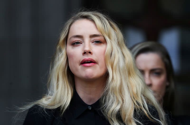 BRITAIN-PEOPLE-DEPPActors Johnny Depp and Amber Heard at the High Court in London