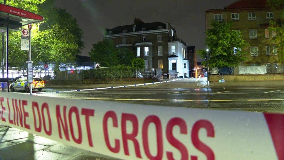 A police car pictured inside the police cordon