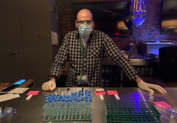 Dr. Todd Hatchette is shown at the first rapid testing site in Nova Scotia last November. It was held at a vacant nightclub in Halifax.