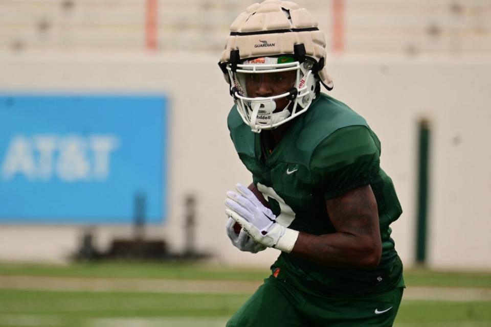 Florida A&M football receiver Jamari Gassett looks down field after a catch during team's first spring scrimmage at Bragg Memorial Stadium in Tallahassee, Florida, Saturday, March 25, 2023