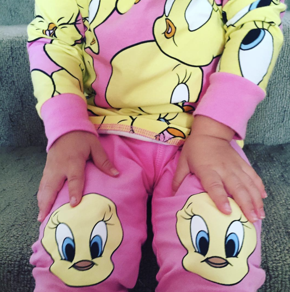 Rove McManus and Tasma Walton's daughter Ruby wearing Looney Tunes pajamas.