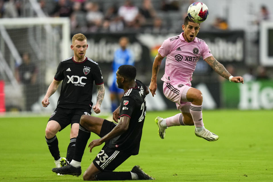 D.C. United midfielder Lewis O'Brien, left, defender Donovan Pines and Inter Miami forward Nicolás Stefanelli go after the ball during the first half of an MLS soccer match, Saturday, July 8, 2023, in Washington. (AP Photo/Alex Brandon)
