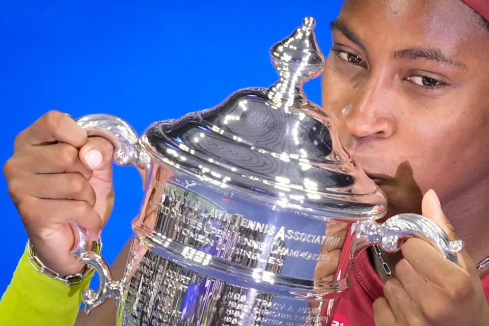 Coco Gauff, of the United States, poses for photograph after defeating Aryna Sabalenka, of Belarus, during the women's singles final of the U.S. Open tennis championships, Saturday, Sept. 9, 2023, in New York. (AP Photo/John Minchillo)