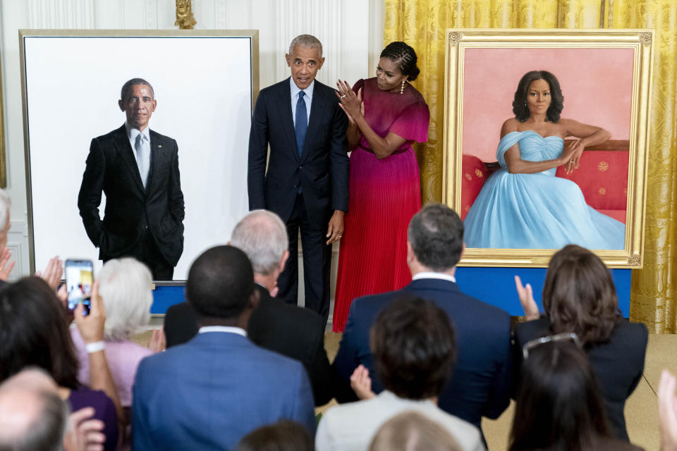 Former President Barack Obama and former first lady Michelle Obama unveil their official White House portraits during a ceremony in the East Room of the White House, Wednesday, Sept. 7, 2022, in Washington. (AP Photo/Andrew Harnik)