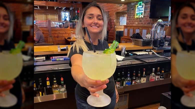 bartender offering drink