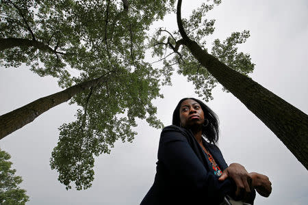 Cynthia Lewis, who is looking to get the case involving the murder of her brother Tyjuan Lewis solved, poses for a portrait in Homewood, Illinois, U.S. June 9, 2016. REUTERS/Jim Young