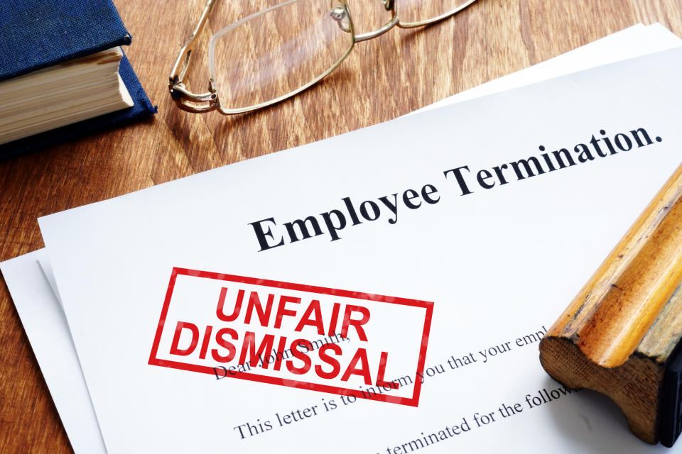 Wrongful dismissal stamp on employee's dismissal.