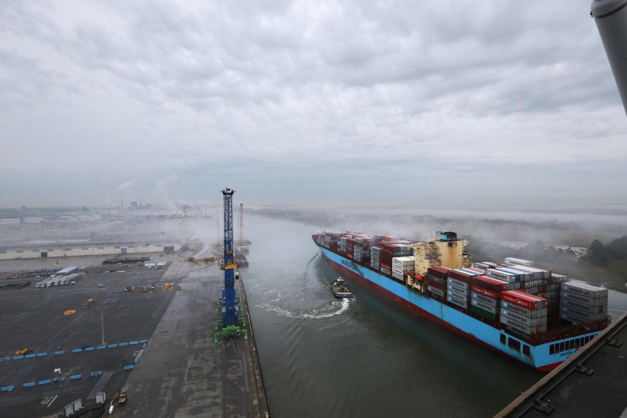 A container ship passes under the Talmadge Bridge in route to the Georgia Ports Authority Garden City Terminal.