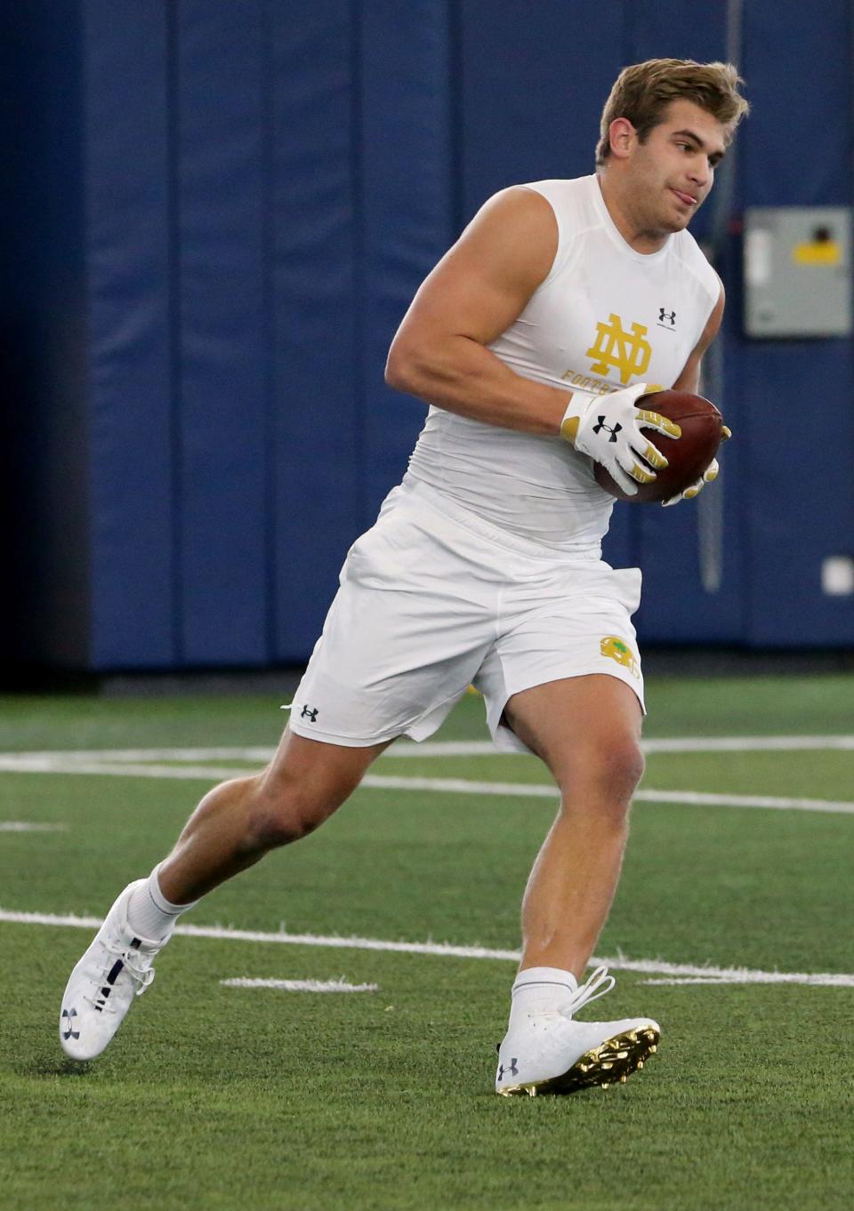 Notre Dame tight end Michael Mayer hauls in a catch during pro day.