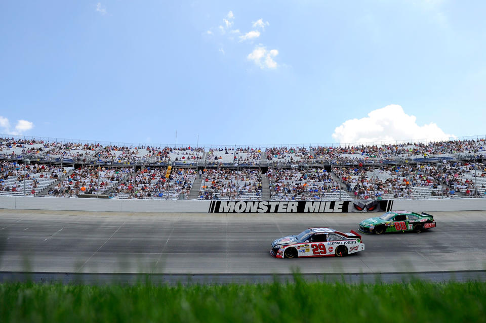 DOVER, DE - JUNE 03: Kevin Harvick, driver of the #29 Jimmy Johns Chevrolet, races Dale Earnhardt Jr., driver of the #88 AMP Energy/National Guard Chevrolet, during the NASCAR Sprint Cup Series FedEx 400 benefiting Autism Speaks at Dover International Speedway on June 3, 2012 in Dover, Delaware. (Photo by John Harrelson/Getty Images for NASCAR)