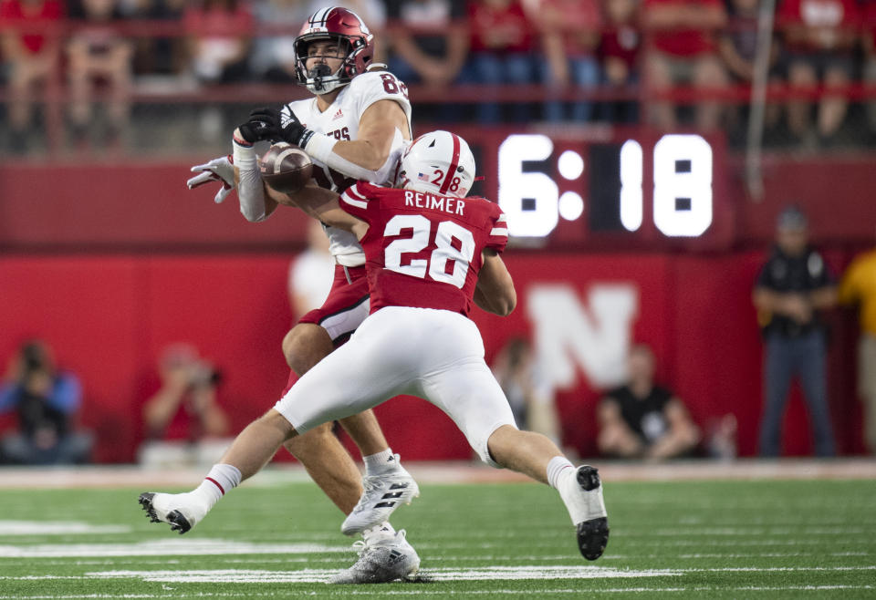 Nebraska linebacker Luke Reimer (28) breaks up a pass intended for Indiana tight end AJ Barner (88) in the 2nd quarter during an NCAA football a game between Nebraska and Indiana, Saturday, Oct. 1, 2022 at Memorial Stadium in Lincoln, Neb. (Noah Riffe/Lincoln Journal Star via AP)