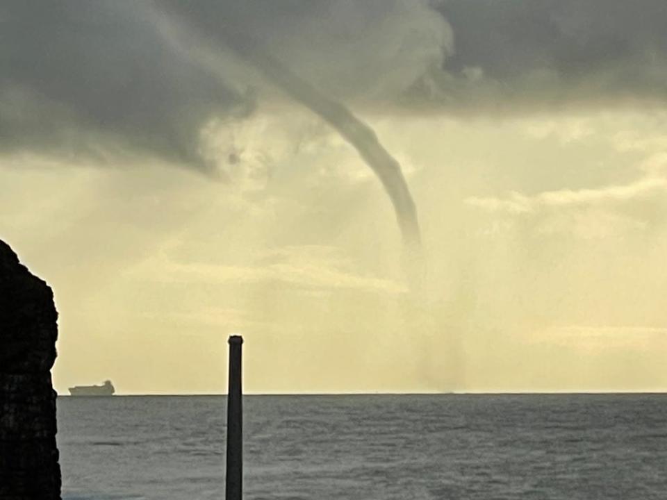 Waterspouts are formed when a rotating column of wind draws in cloud droplets (James Thomas/thefamilyrhino.com) (PA)