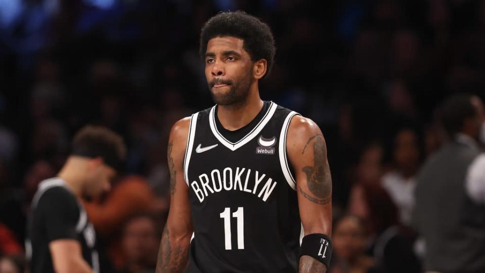 Kyrie Irving solo shot black uniform close up at Barclays