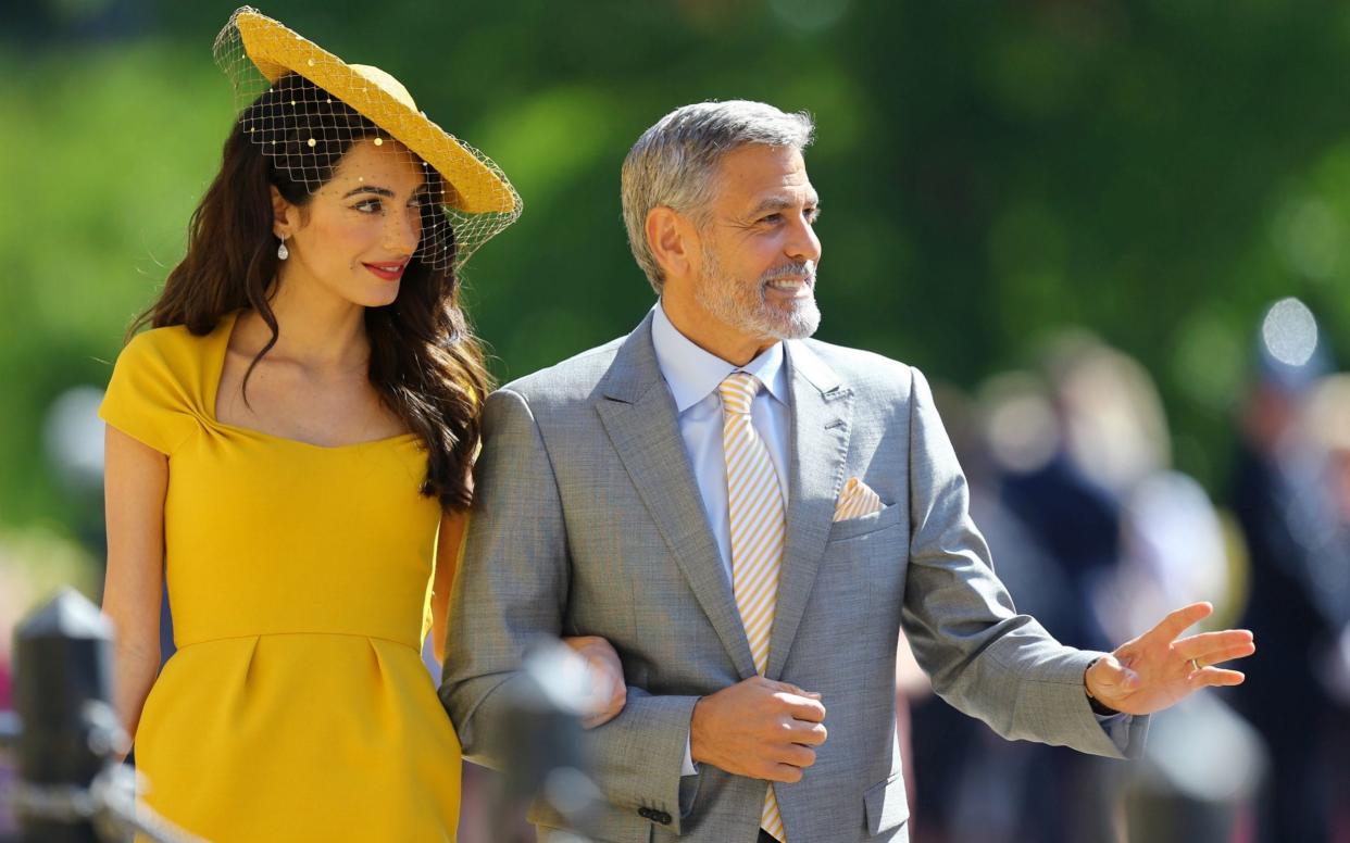 Amal Clooney and George Clooney arrive - PA