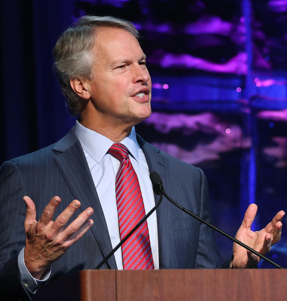 Gary Pruitt, president and CEO of The Associated Press, speaks to editors and publishers at the Newspaper Association of America’s mediaXchange 2014 convention in Denver, Tuesday, March 18, 2014. (AP Photo/Brennan Linsley)