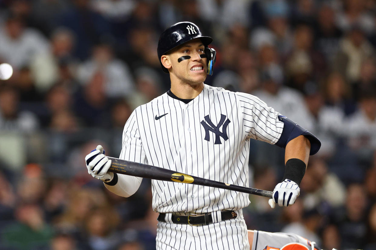 NEW YORK, NEW YORK - OCTOBER 22: Aaron Judge #99 of the New York Yankees reacts after striking out against the Houston Astros during the sixth inning in game three of the American League Championship Series at Yankee Stadium on October 22, 2022 in New York City. (Photo by Elsa/Getty Images)