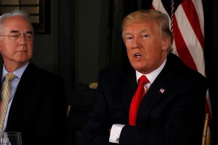 U.S. President Donald Trump (R), flanked by Secretary of Health and Human Services (HHS) Tom Price, delivers remarks on North Korea during an opioid-related briefing at Trump's golf estate in Bedminster, New Jersey, U.S., August 8, 2017. REUTERS/Jonathan Ernst