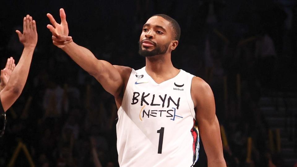 Feb 15, 2023; Brooklyn, New York, USA; Brooklyn Nets forward Mikal Bridges (1) reacts after a three point basket against the Miami Heat during the second half at Barclays Center. Mandatory Credit: Vincent Carchietta-USA TODAY Sports