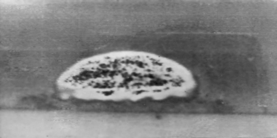 FILE - This July 16, 1945, file photo, taken 6-miles away shows the first atomic bomb explosion at the Trinity Test Site in Alamogordo, N.M. A bipartisan group of lawmakers is renewing the push to expand a federal compensation program for radiation exposure following uranium mining and nuclear testing carried out during the Cold War. Advocates have been trying for years to bring awareness to the lingering effects of nuclear fallout surrounding the Trinity Site in southern New Mexico and on the Navajo Nation, where more than 30 million tons of ore were extracted over decades to support U.S. nuclear activities. (AP Photo/File)