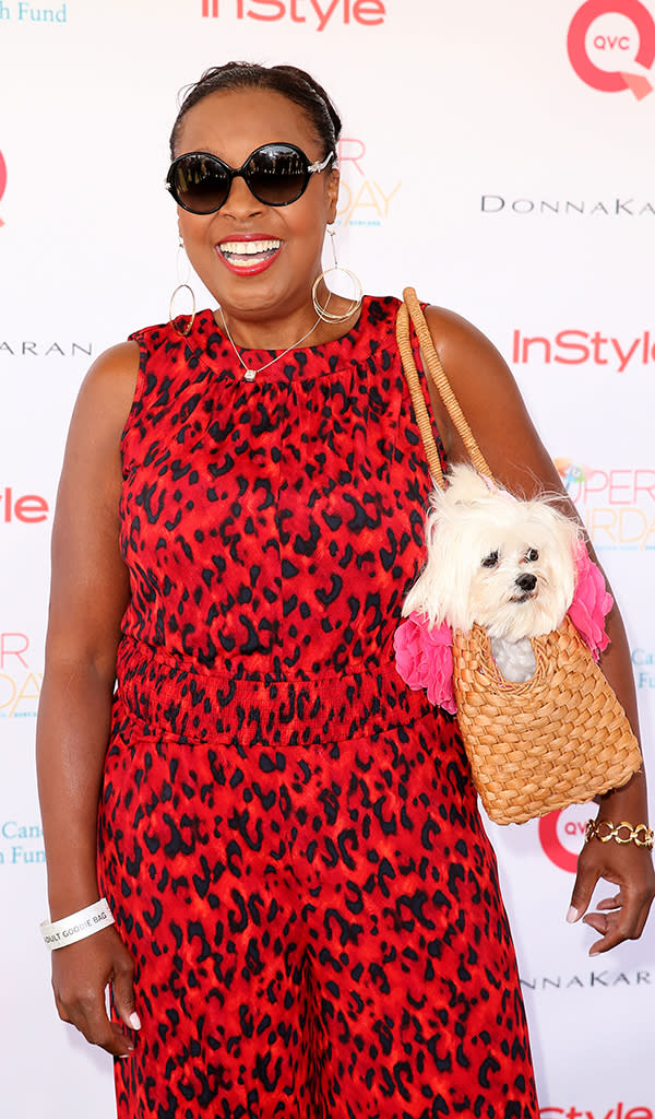 TV personality Star Jones arrives with her terrier dog Pinky at QVC Super Saturday Live! at Nova's Ark Project in Water Mill, New York