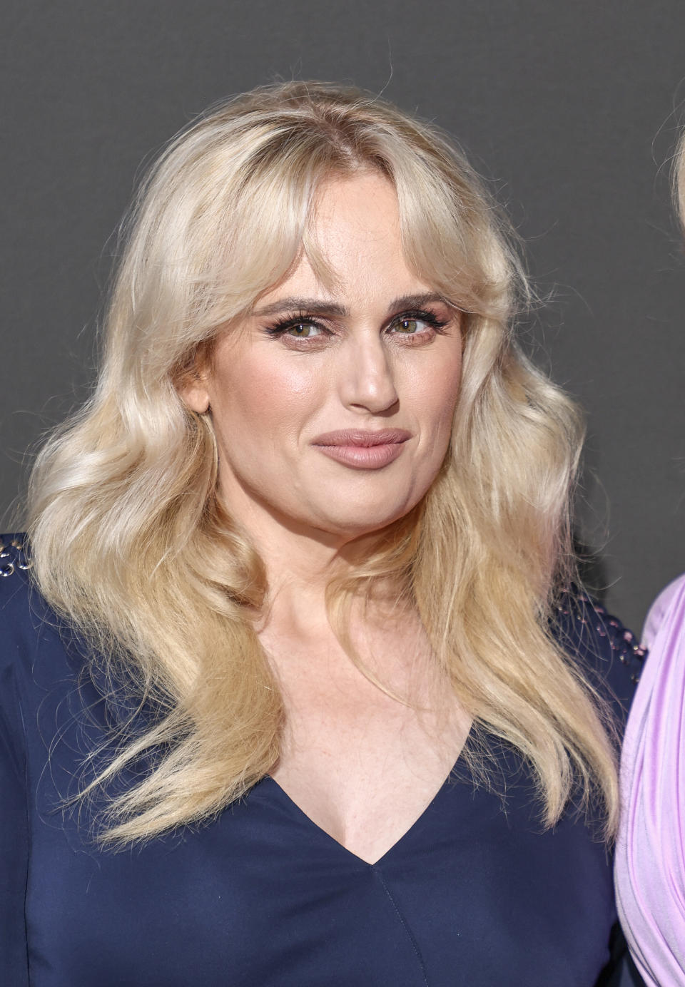 Rebel Wilson wearing a = dress at a formal event