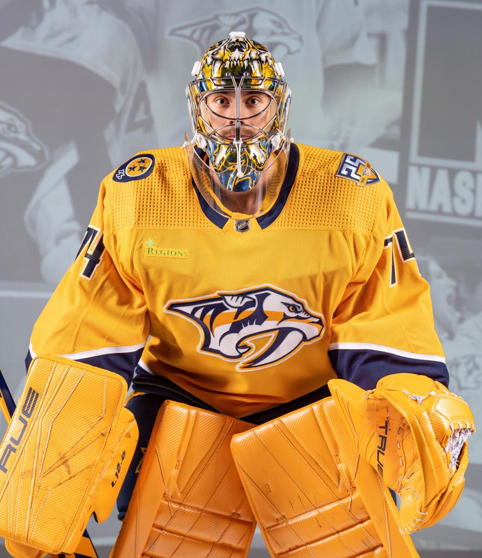 Nashville Predators goalie Juuse Saros models the Regions logo patch that will appear on the team's jerseys beginning this season.