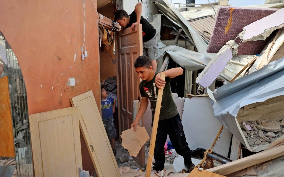 Israel launched deadly air strikes on Gaza in response to a barrage of rockets fired by the Islamist movement Hamas amid spiralling violence sparked by unrest at Jerusalem's Al-Aqsa Mosque compound - MOHAMMED ABED /AFP