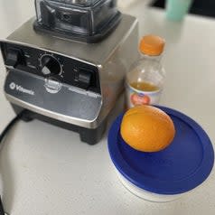 smoothie ingredients next to a blender