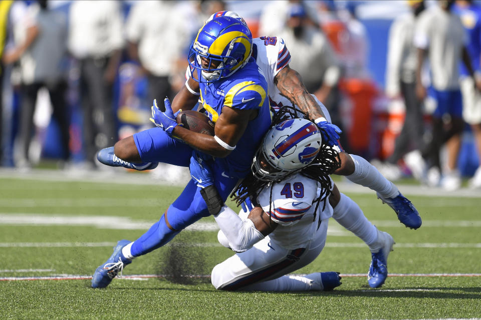 Los Angeles Rams' Robert Woods, left, is tackled b Buffalo Bills' Tremaine Edmunds, right, during the second half of an NFL football game Sunday, Sept. 27, 2020, in Orchard Park, N.Y. (AP Photo/Adrian Kraus)