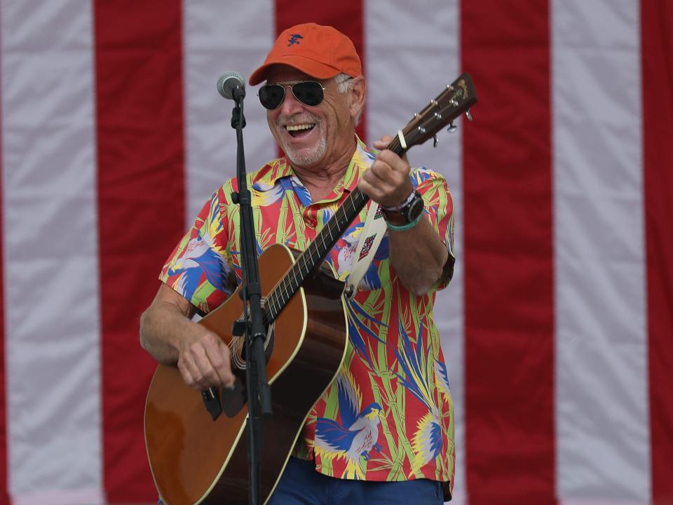 Jimmy Buffett plays a song as he performs at a Get Out the Vote rally for U.S. Senator Bill Nelson (D-FL) and Florida Democratic governor candidate Andrew Gillum at the Meyer Amphitheatre on November 03, 2018 in West Palm Beach, Florida