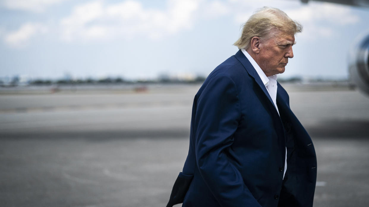 Trump boards his plane at Palm Beach International Airport in West Palm Beach, Fla., on March 13. (Photo by Jabin Botsford/The Washington Post via Getty Images)