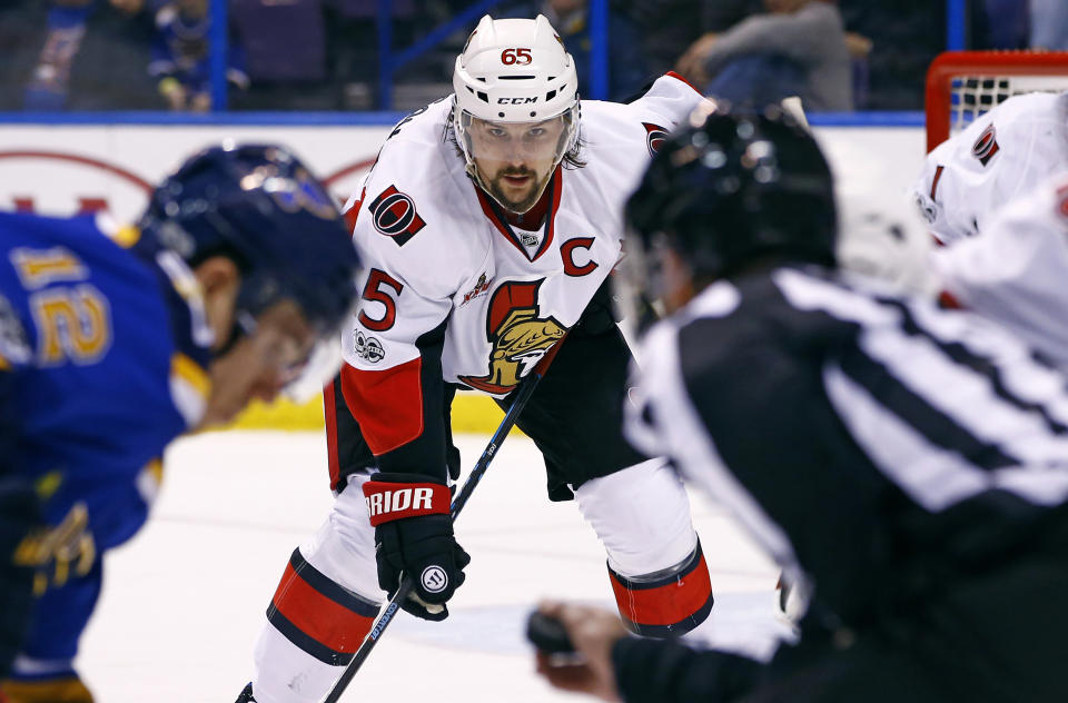 FILE - In this Jan. 17, 2017, file photo, Ottawa Senators' Erik Karlsson, middle, of Sweden, waits for a face-off during the second period of an NHL hockey game against the St. Louis Blues, in St. Louis. The San Jose Sharks have acquired two-time Norris Trophy-winning defenseman Erik Karlsson from the Senators, the teams announced Thursday, Sept. 13, 2018. (AP Photo/Billy Hurst, File)